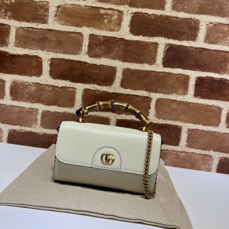 G*u*i top handle bags